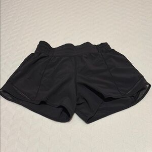 Lululemon Black Athletic Shorts with Elastic Waistband and Relaxed Fit